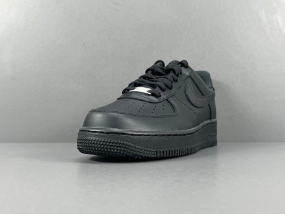 Nike Air Force 1 Black with classic silhouette, smooth leather upper, and all-black finish