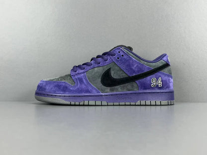 Nike SB Dunk Low x Supreme 94 Ink sneaker in deep blue leather
