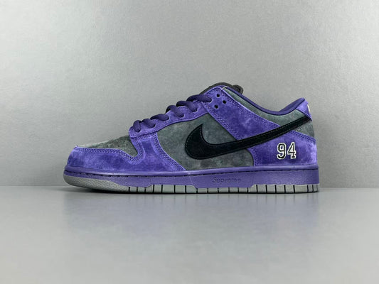 Nike SB Dunk Low x Supreme 94 Ink sneaker in deep blue leather
