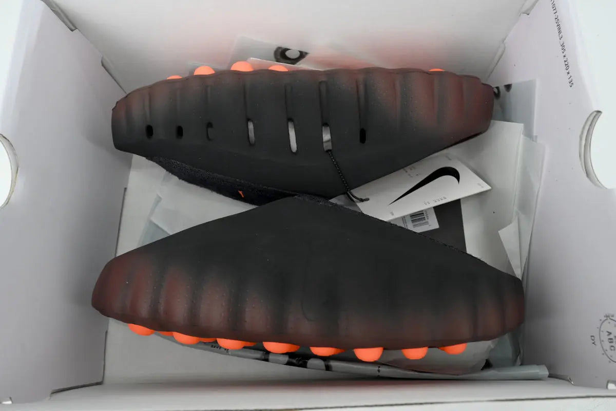 Nike Mind 001 FlyKnit Slide Bronze Eclipse Total Orange top view FlyKnit strap footbed layout