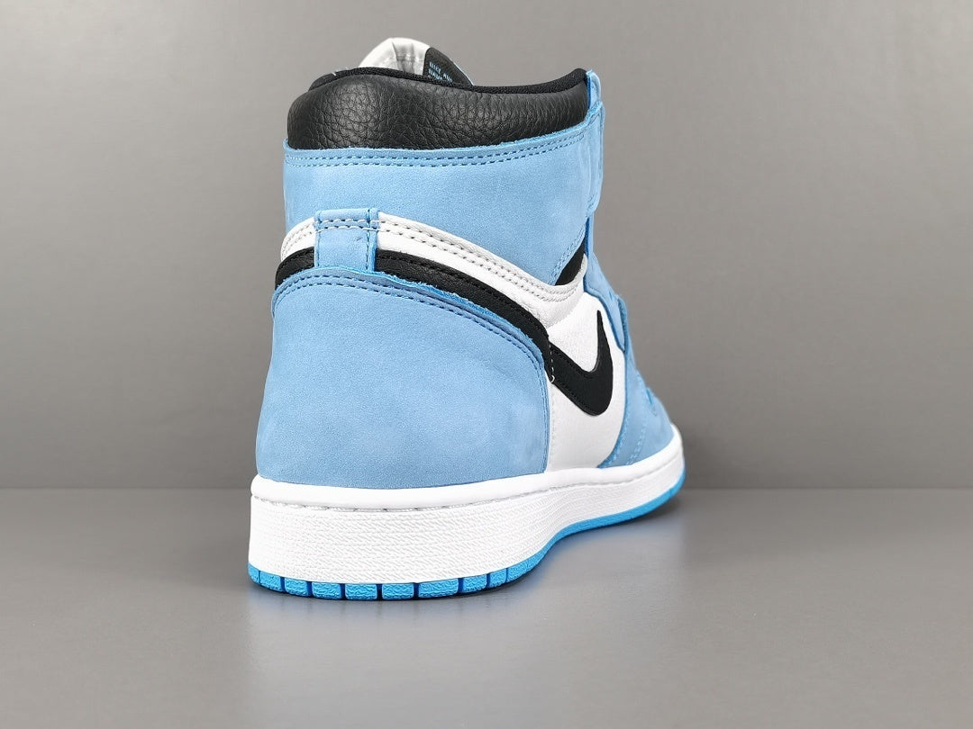 Jordan 1 Retro High OG University Blue sneakers with suede overlays and classic style.