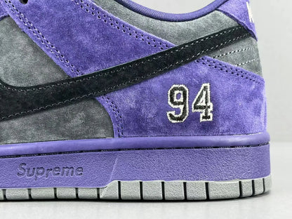 Nike SB Dunk Low x Supreme 94 Ink sneaker in deep blue leather
