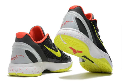 Nike Kobe 6 Supreme Chaos sneakers with bold yellow and purple low-top design.
