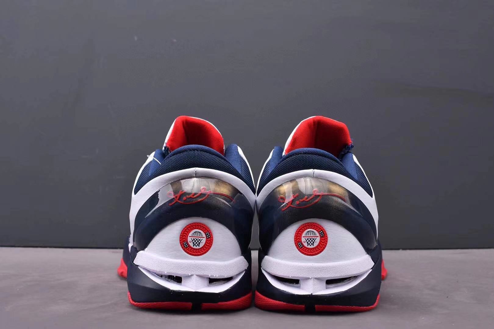 Nike Kobe 7 Gold Medal basketball shoes black with gold metallic accents
