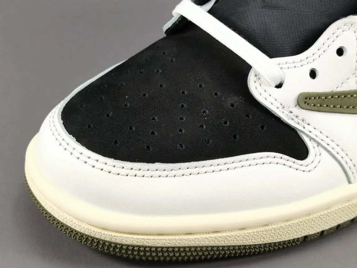 "Jordan 1 Low x Travis Scott Olive with olive suede, black leather overlays, reverse Swoosh, and Cactus Jack branding."