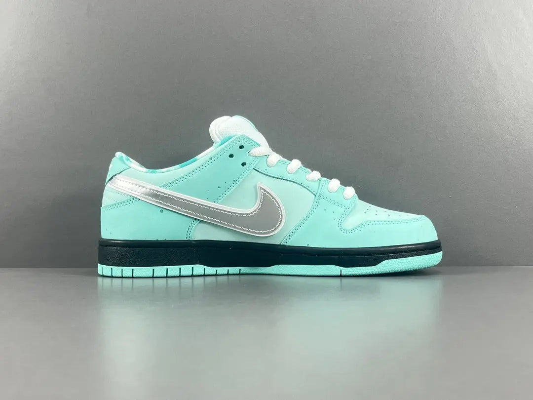 Nike SB Dunk Tiffany Lobster low top sneaker side view aqua white