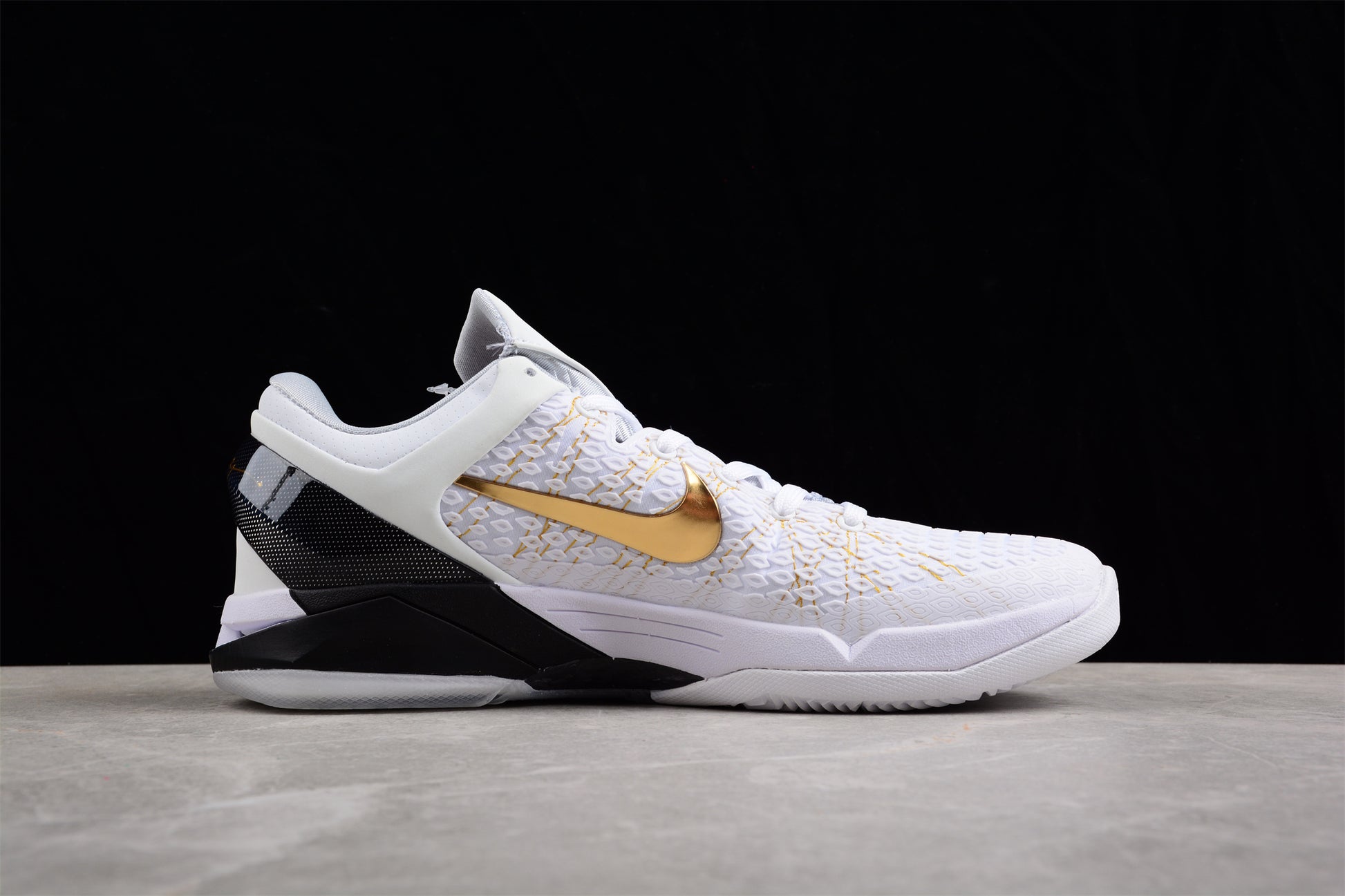 Nike Kobe 7 Elite Home basketball shoes white with purple and gold Lakers accents
