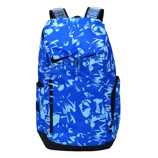 A blue and white abstract patterned Nike backpack with black accents, shown against a plain white background.