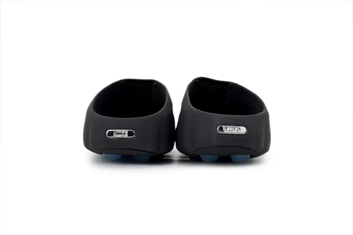 Nike Mind 001 NOCTA Slide Black Concept heel view NOCTA Nike dual branding tonal black detail