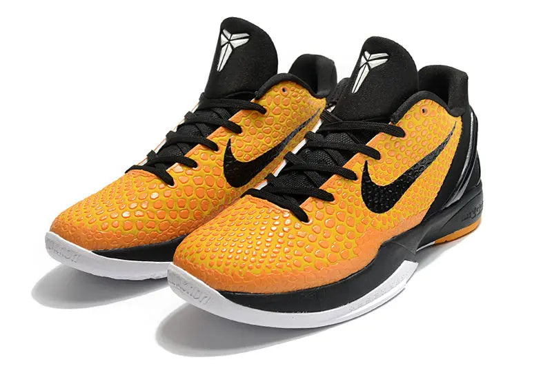 Nike Kobe 6 Protro Lightbulb edition sneakers in bright yellow with sleek low-top design.
