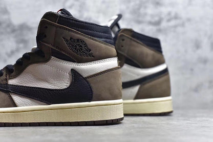 Jordan 1 High Travis Scott sneakers featuring iconic reverse Swoosh and premium design