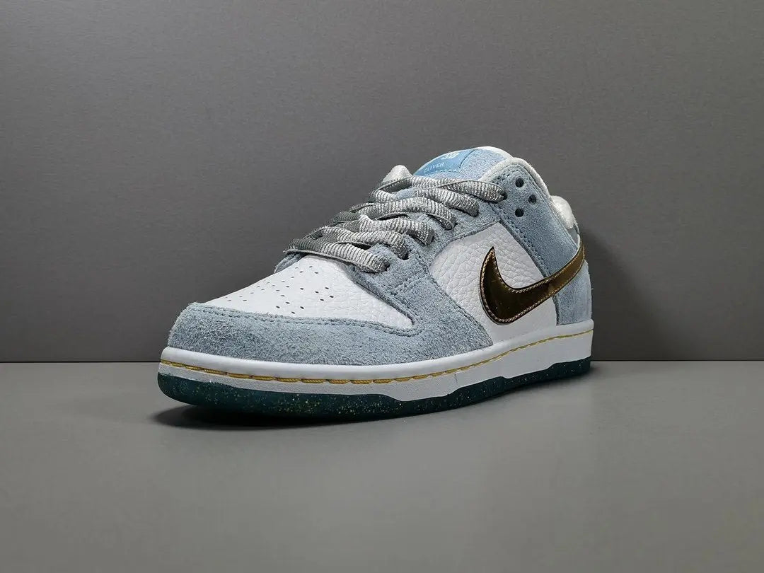 Nike SB Dunk Low Sean Cliver white gold sneaker holiday special edition red velvet lining skate shoe