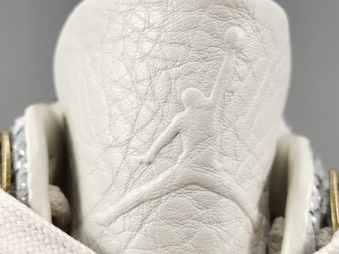 Air Jordan 4 Snakeskin sneakers side view luxury textured retro basketball shoes
