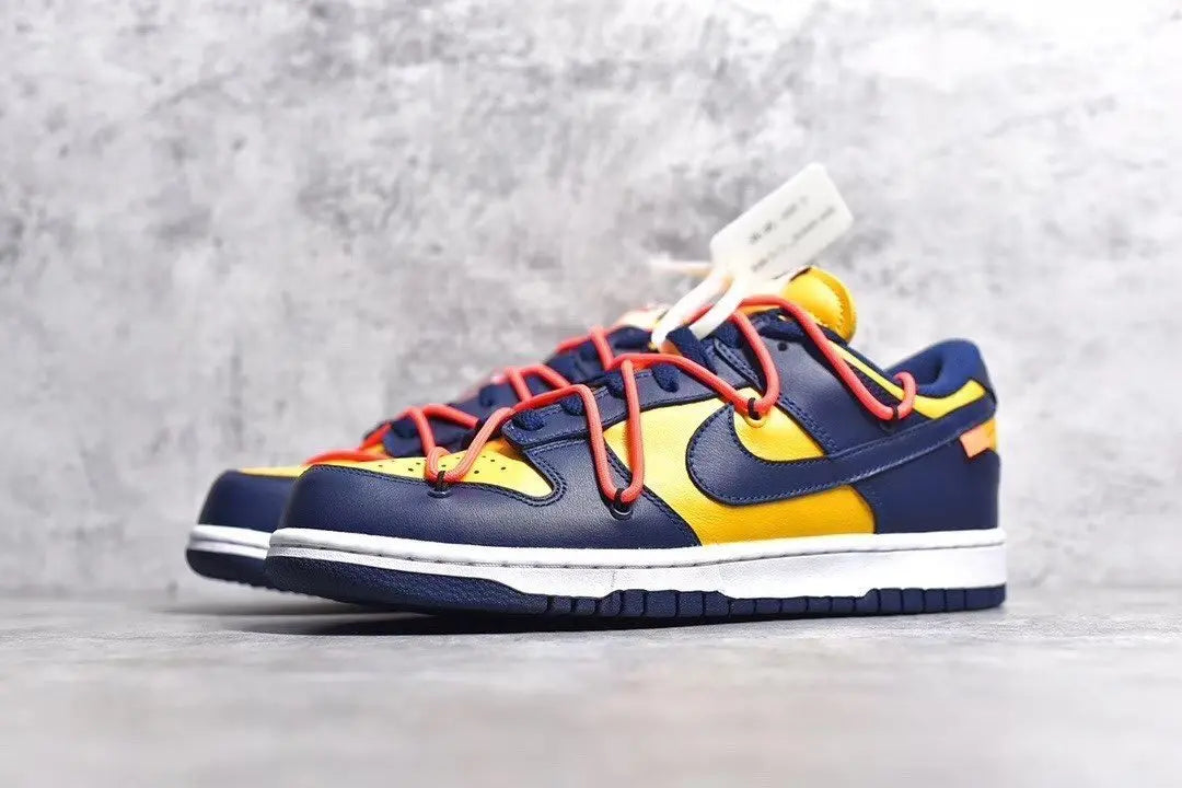 Nike Dunk Off White University Gold navy low top sneaker side view