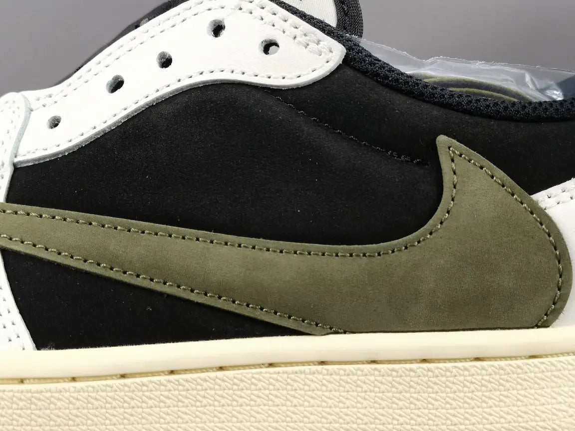 "Jordan 1 Low x Travis Scott Olive with olive suede, black leather overlays, reverse Swoosh, and Cactus Jack branding."