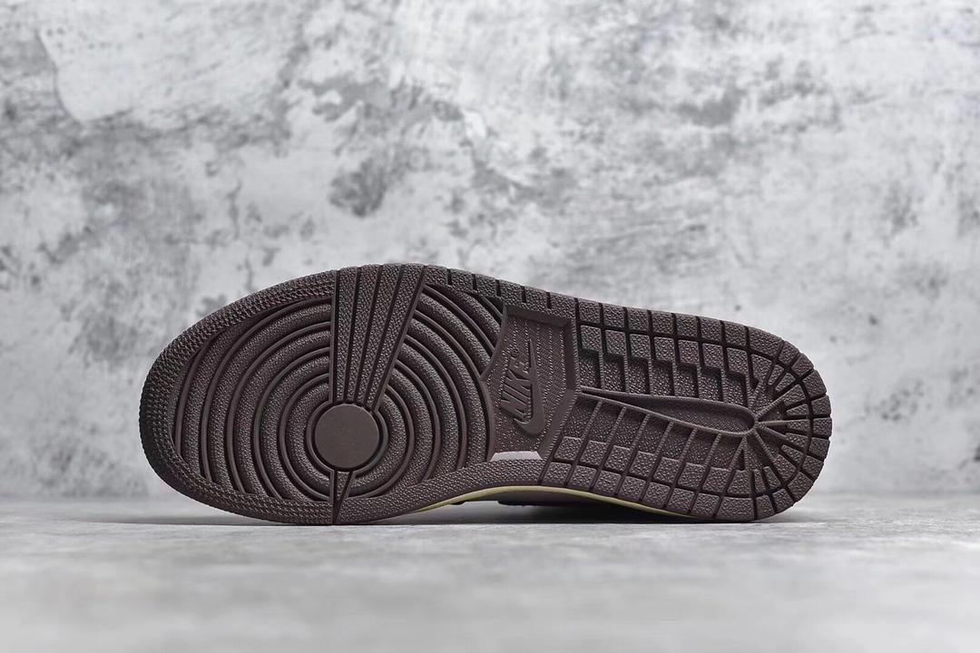 Jordan 1 High Travis Scott sneakers featuring iconic reverse Swoosh and premium design