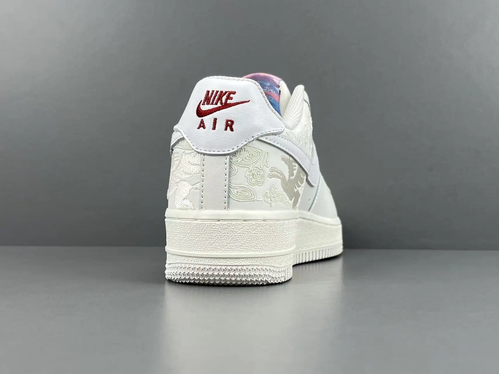 Nike Air Force 1 Pegasus Pack Phantom side view all-white leather sneaker