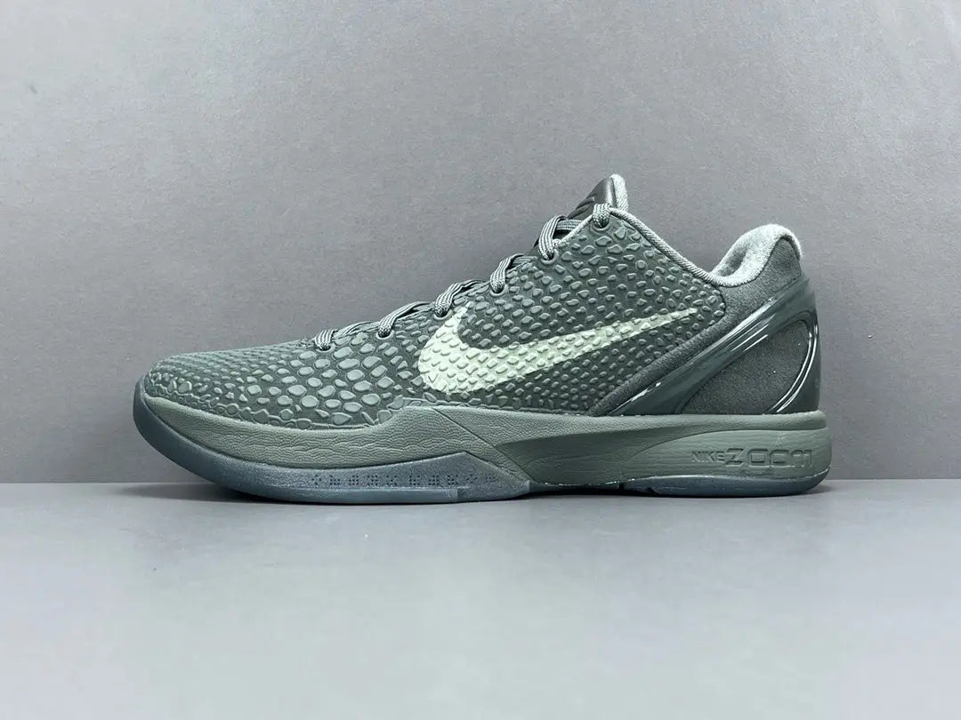 “Black and purple Nike Kobe 6 Protro sneakers with ‘Fade to Black’ design.”
