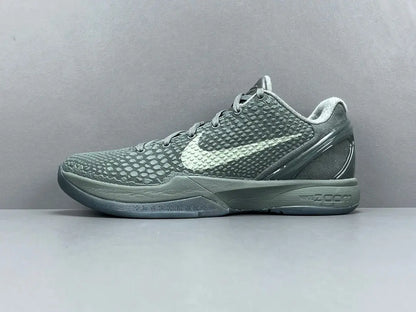 “Black and purple Nike Kobe 6 Protro sneakers with ‘Fade to Black’ design.”
