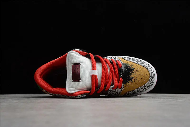 Nike SB Dunk Low What The Paul colorful patchwork upper with Nike Swoosh lateral view on white background