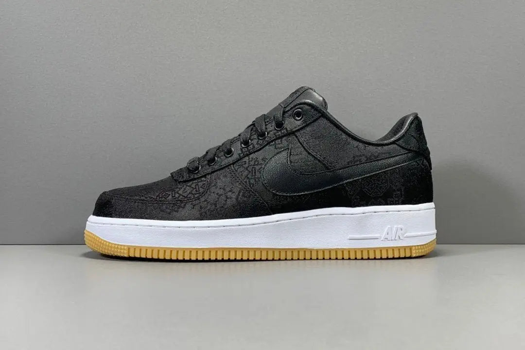 White Nike Air Force 1 x Fragment CLOT collaboration sneaker with logos

