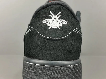 "Jordan 1 Low Travis Scott Phantom with black nubuck, white stitching, and signature reverse Swoosh."