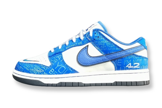 Nike Dunk Low “Jackie Robinson” sneaker with black, grey, and royal blue accents honoring the baseball legend
