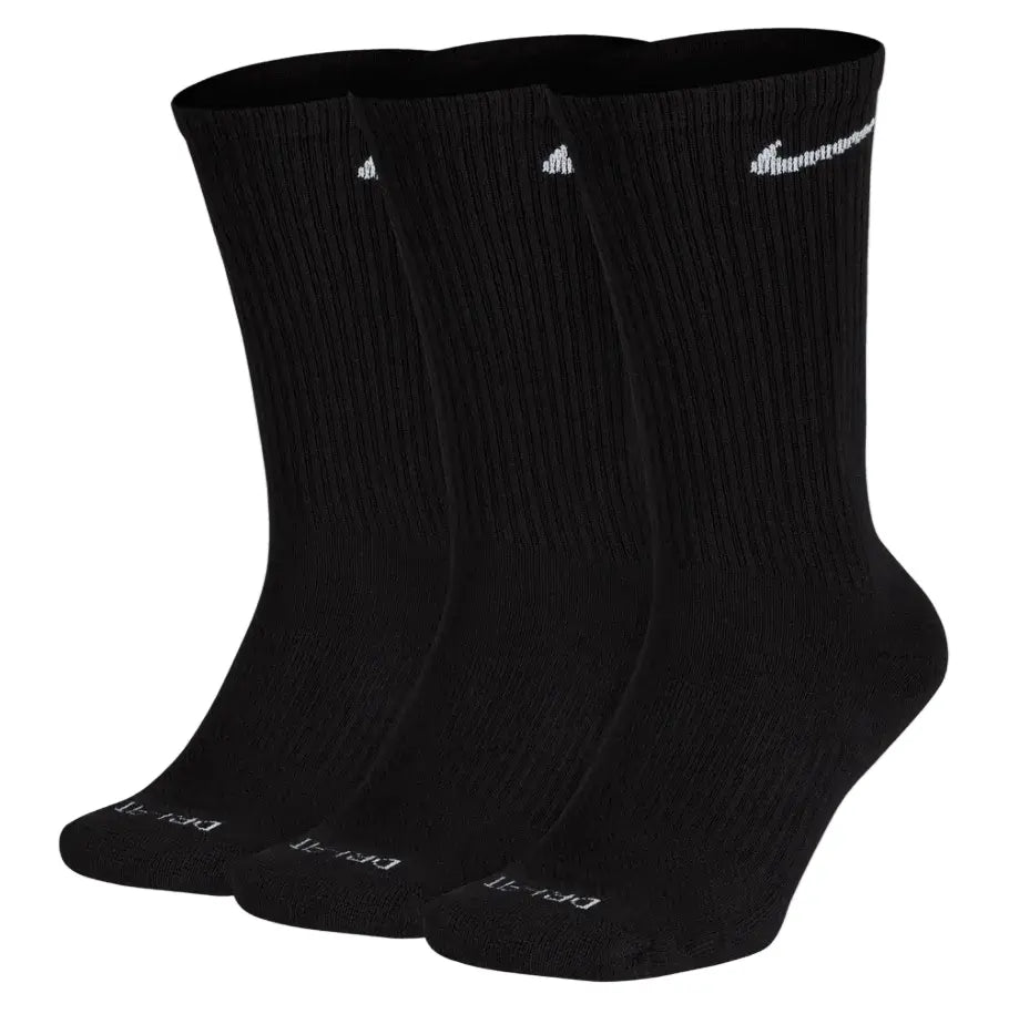 Black Nike cotton crew socks with a smooth knit finish, ribbed cuffs for a snug fit, and a contrasting white Nike swoosh logo near the top.