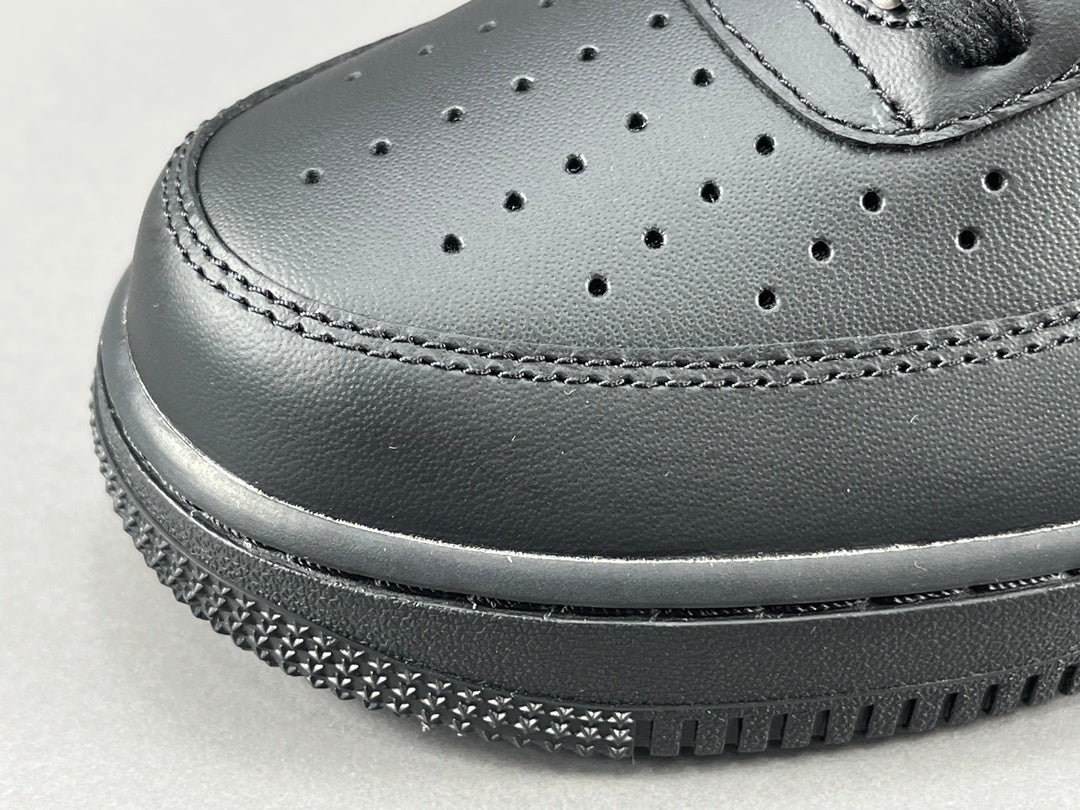 Nike Air Force 1 Black with classic silhouette, smooth leather upper, and all-black finish