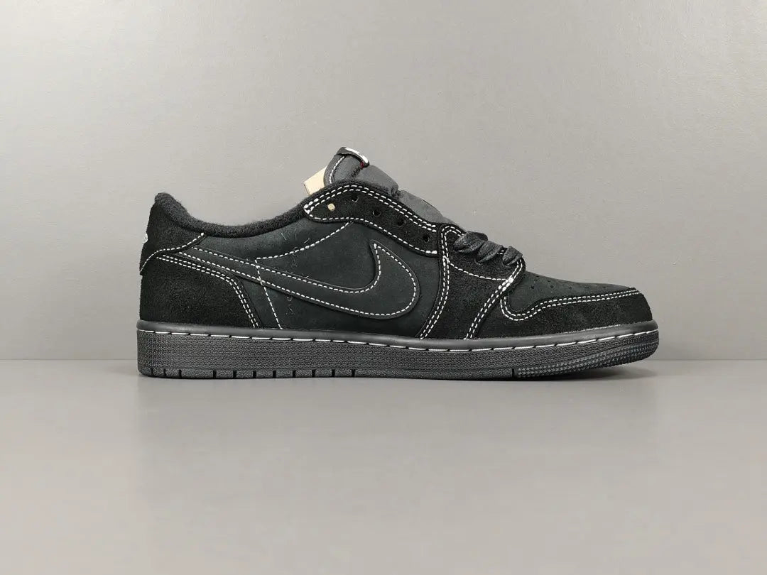 "Jordan 1 Low Travis Scott Phantom with black nubuck, white stitching, and signature reverse Swoosh."