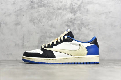 "Air Jordan 1 Low Travis Scott x Fragment – Iconic sneaker featuring a mix of white, blue, and black leather with Travis Scott’s signature reverse Swoosh and Fragment branding."
