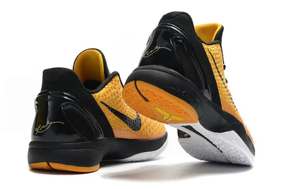 Nike Kobe 6 Protro Lightbulb edition sneakers in bright yellow with sleek low-top design.
