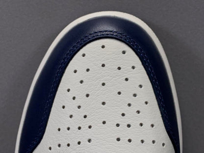 Jordan 1 High Obsidian UNC sneakers featuring navy, university blue, and premium leather