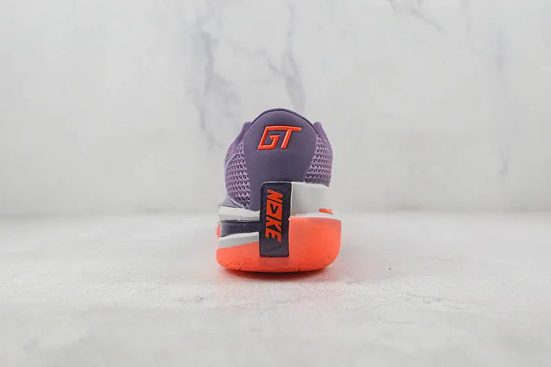 Nike Violet Crimson athletic shoes for basketball and training