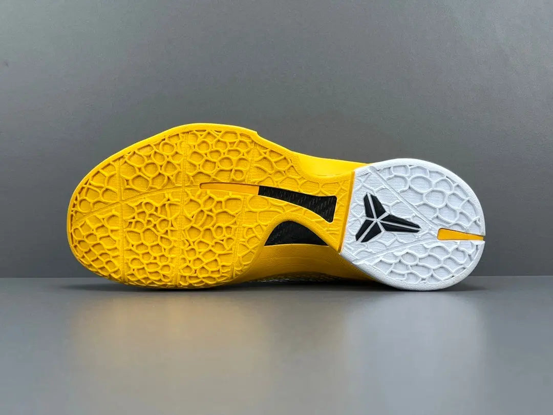 Nike Kobe 6 Protro Off-White yellow basketball shoes with bold collaborative design
