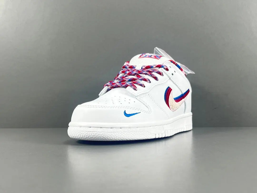 Nike SB Dunk Low Parra white sneaker with pink blue green abstract overlays limited edition skate shoe