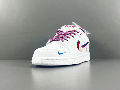 Nike SB Dunk Low Parra white sneaker with pink blue green abstract overlays limited edition skate shoe