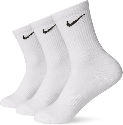 White Nike cotton crew socks featuring a soft knit texture, ribbed cuffs for a secure fit, and the signature black Nike swoosh logo near the top.