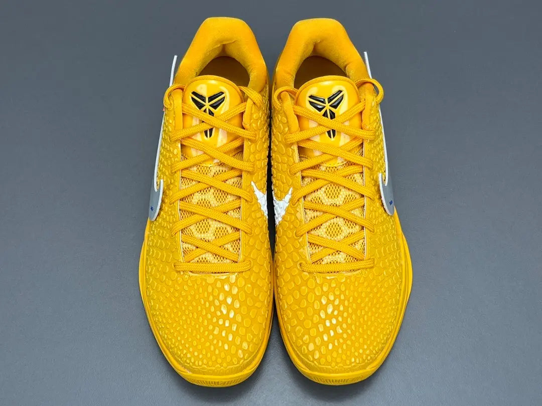 Nike Kobe 6 Protro Off-White yellow basketball shoes with bold collaborative design
