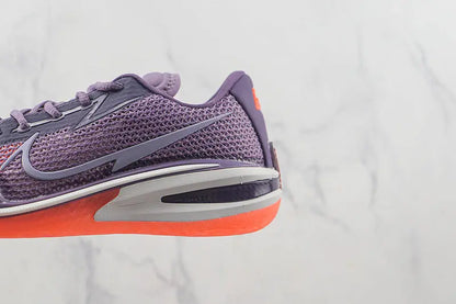 Nike Violet Crimson athletic shoes for basketball and training