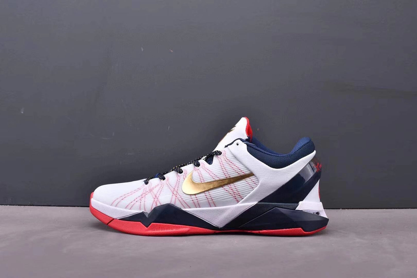Nike Kobe 7 Gold Medal basketball shoes black with gold metallic accents
