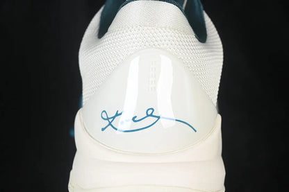 Heel view of Caitlin Clark Nike Kobe 5 Protro Coconut Milk Bright Spruce shoes