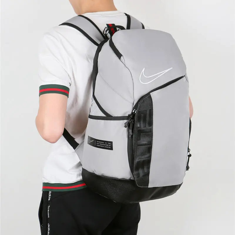 Gray and black Nike Elite Pro basketball backpack with structured design, padded shoulder straps, and multiple compartments
