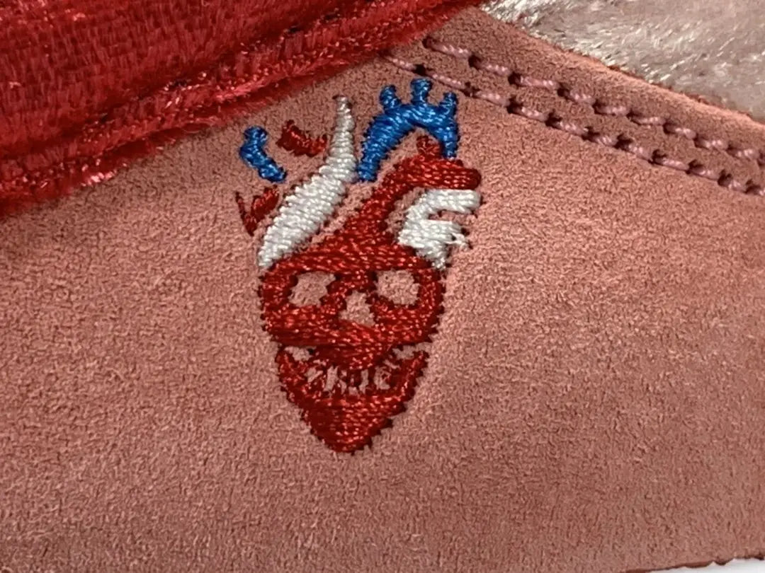 Nike SB Dunk Low Strangelove Skateboards pink velvet sneaker with heart embroidery limited edition Valentine’s Day collaboration