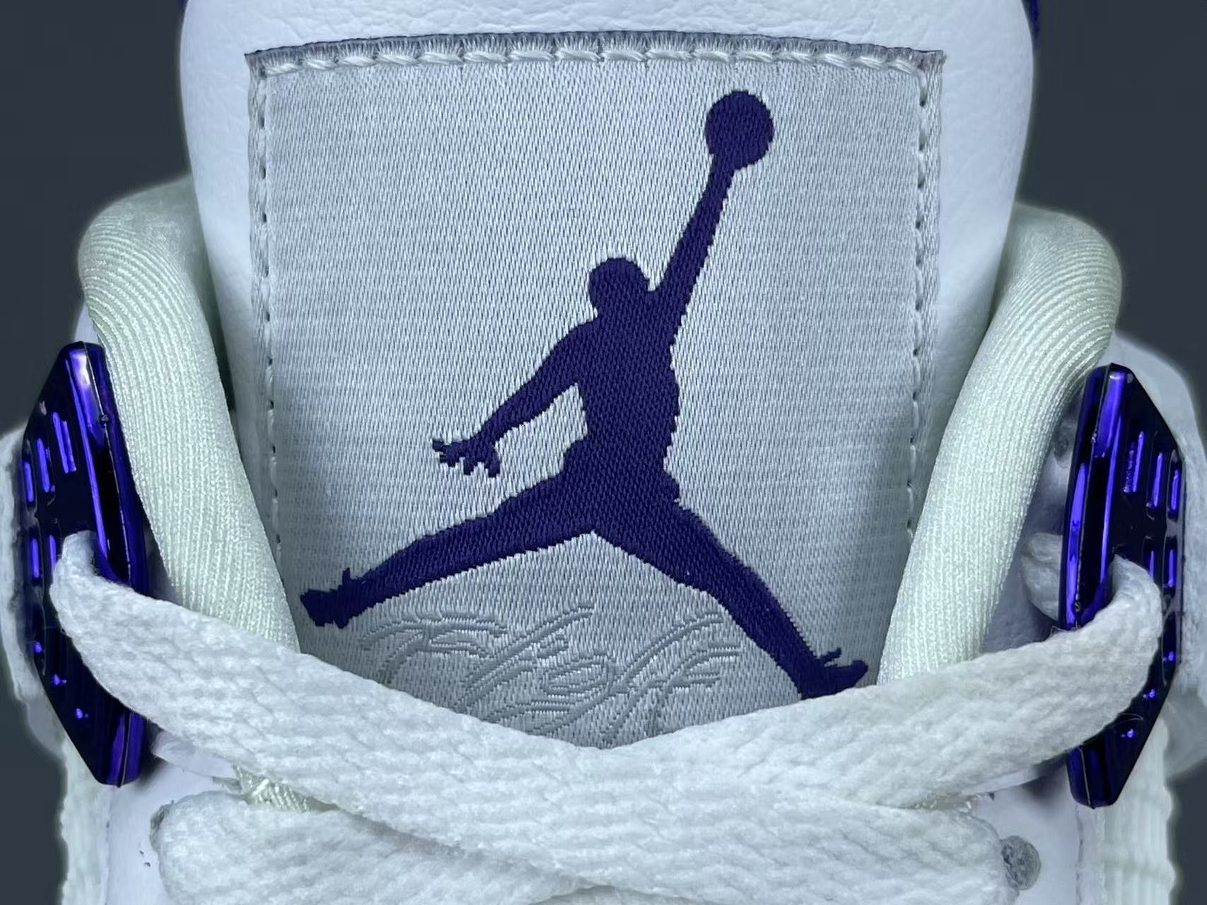 Air Jordan 4 Metallic Purple clean white sneakers with metallic purple details