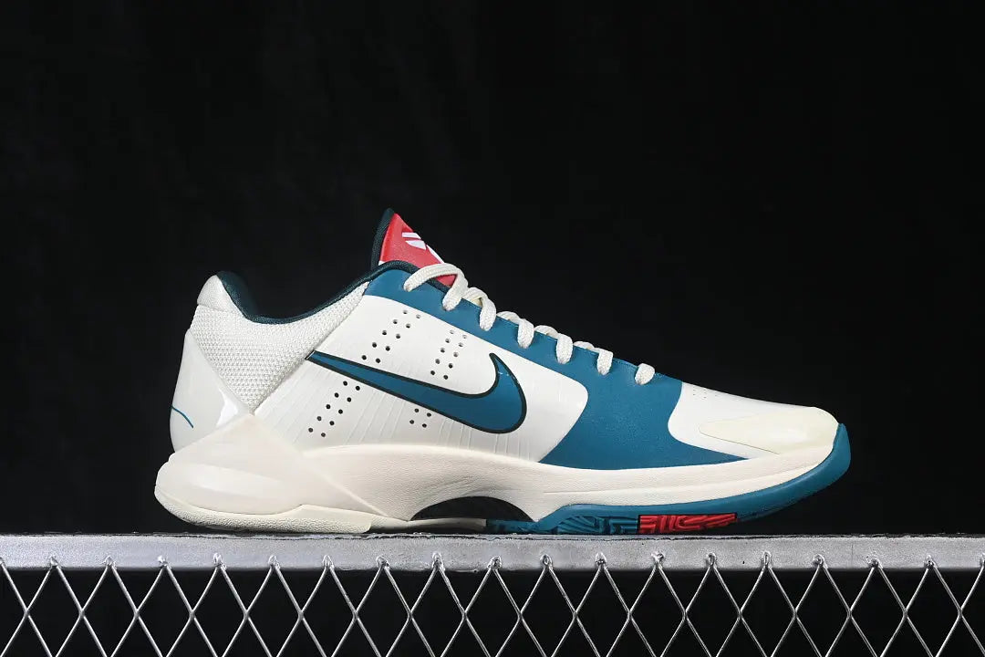 Side profile of the Nike Kobe 5 Protro Caitlin Clark Coconut Milk Bright Spruce
