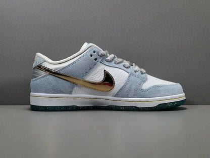 Nike SB Dunk Low Sean Cliver white gold sneaker holiday special edition red velvet lining skate shoe
