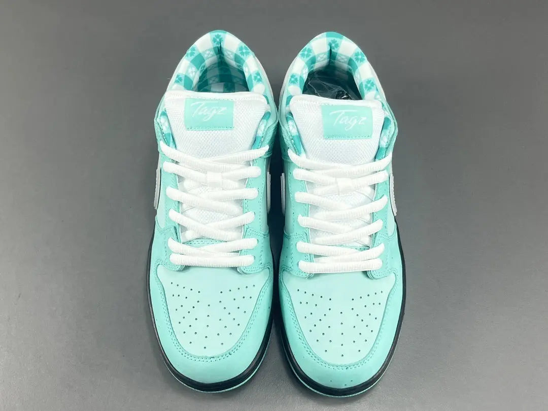 Nike SB Dunk Tiffany Lobster low top sneaker side view aqua white