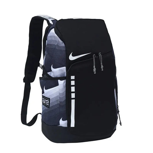 A Nike athletic backpack in black, gray, and white, featuring a gradient pattern on the side, a white Nike swoosh on the front, and a zippered pocket.