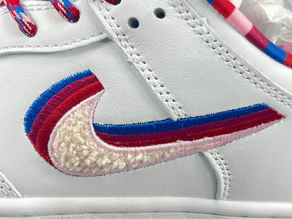 Nike SB Dunk Low Parra white sneaker with pink blue green abstract overlays limited edition skate shoe